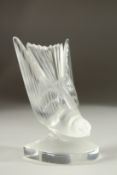 A LALIQUE GLASS BIRD BOOK END. Etched Lalique, France. 16cms high.