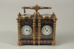 A DOUBLE CLOISONNE ENAMEL CLOCK with carrying handle. 12cms high.
