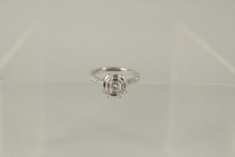 AN 18ct WHITE GOLD AND DIAMOND RING.