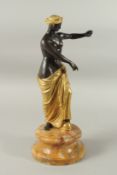 A TWO-COLOURED BRONZE SEMI-CLAD YOUNG LADY on a circular marble base. 45cms high.