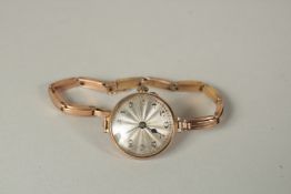A LADIES' 9ct GOLD NAUTICAL ROLEX WRISTWATCH.