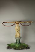 A RARE COALBROOKDALE CAST IRON STICK STAND painted in three colours, with a dog on his hind legs