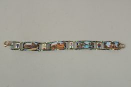 A SILVER AND ENAMEL EGYPTIAN REVIVAL BRACELET.