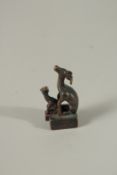 A SMALL BRONZE SEAL, TWO DEER. 4.5cms.
