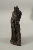 A GOOD 19TH CENTURY BRONZE OF A CLASSICAL YOUNG LADY resting on a pillar. 25cms high.