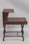 A CHINESE REDWOOD TWO-TIER STAND. 90cms high x 65cms long.
