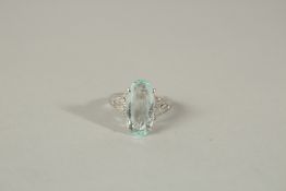 AN 18ct WHITE GOLD ART DECO AQUAMARINE AND DIAMOND RING.