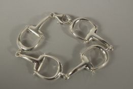 A STERLING SILVER SHAFFLE BRACELET.