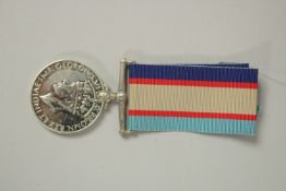 AUSTRALIAN SERVICE MEDAL, WWII 1939-1945, awarded to NX67665 T. A. AUSTIN, with ribbon.