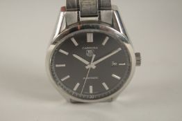 A TAG CARRERA AUTOMATIC WRIST WATCH. Swiss made since 1860. Black face.