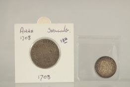 A GEORGE III SIXPENCE, 1818 AND A QUEEN ANNE SHILLING, 1708 (2)