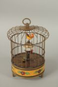 A GILT METAL AND CLOISONNE BIRDCAGE CLOCK. 17cms high.
