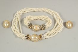 A SUITE OF PEARL JEWELLERY, A SIX-ROW NECKLACE, BRACELET AND EARRINGS