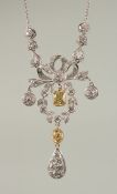 A NATURAL YELLOW DIAMOND AND WHITE DIAMOND FANCY PENDANT ON A CHAIN. 3.5cts approx.