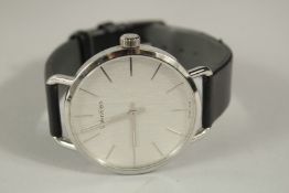 A CALVIN KLEIN STAINLESS STEEL WRISTWATCH with black strap. K713 211.