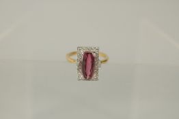 AN 18ct YELLOW GOLD, PINK TOURMALINE AND DIAMOND RING.