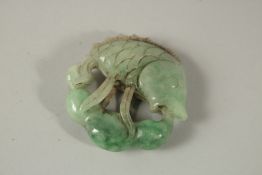 A JADE FISH CARVING.