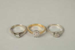 THREE 18ct GOLD RINGS.