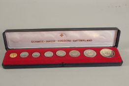 SWITZERLAND. AN EIGHT COIN SET.