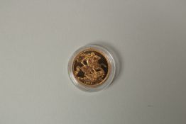 1986, A FULL GOLD SOVEREIGN in capsule.