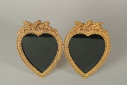 A DOUBLE GILT BRONZE EASEL PHOTOGRAPH FRAME. 18cms.
