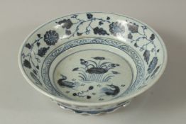 A CHINESE BLUE AND WHITE CIRCULAR BOWL.