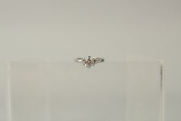 AN 18ct WHITE GOLD AND PLATINUM SOLITAIRE DIAMOND RING.