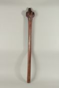 A LARGE HEAVY WOODEN CLUB with etched handle. 42ins long.