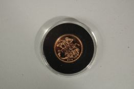 2016. A FULL GOLD BU SOVEREIGN in capsule FDC with box and COA.