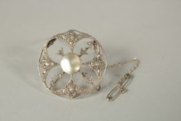 A NATURAL PEARL AND DIAMOND 1920'S BROOCH.