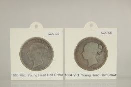 TWO VICTORIA YOUNG HEAD HALF CROWN, 1884 - 1885.