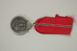 A RUSSIAN FRONT MEDAL for those who took part in the first winter campaign between 15/11/1941 and
