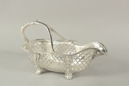 A SILVER PLATE BOTTLE POURER.