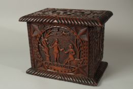 AN EARLY DUTCH CARVED WOOD BOX AND COVER, the panels carved with Biblical scenes. The sides carved