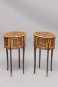 A PAIR OF LOUIS XVITH DESIGN OVAL MAHOGANY BEDSIDE TABLES with three drawers and curving legs. 70cms