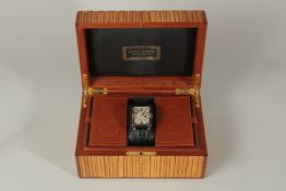 A VERY GOOD ROGER REBUS 18ct GOLD WRISTWATCH with leather strap, No. 06128, in a good inlaid