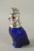 A BLUE GLASS AND SILVER PLATED COCKATOO CLARET JUG. 24cms high.