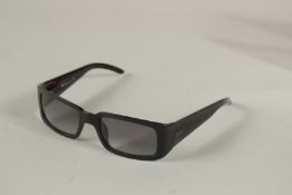 A PAIR OF DIOR SUNGLASSES, boxed.