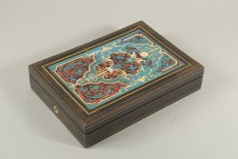 A 19TH CENTURY FRENCH BOULLE INLAID ARTIST'S BOX with fitted interior and key. 12ins long.