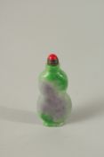 A JADE SNUFF BOTTLE.