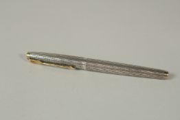 A PARKER STERLING SILVER AND GOLD FOUNTAIN PEN.