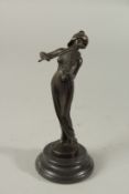 A SMALL ART DECO DESIGN BRONZE OF A GIRL PLAYING A VIOLIN on a circular base. 18cms high.