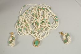 A GOOD SEVEN-ROW PEARL AND JADE NECKLACE AND EARRINGS, in a bag.