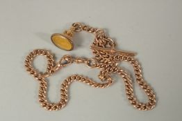 A 9ct GOLD ALBERT CHAIN with fob seal. Approx. 47grms.