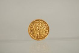 A REPLICA ARCADIUS GOLD COIN. 5grms.