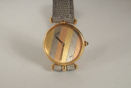 A VAN CLEEF & ARPELS 18ct YELLOW GOLD WRISTWATCH, with a leather strap. 2533218 18382, in a Van