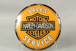 A HARLEY DAVIDSON MOTORCYLE CIRCULAR ENAMEL SIGN. 29cms diameter.