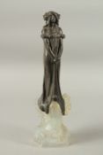 JULIEN CAUSSE (1869 - 1938. THE ICE MAIDEN, a bronze maiden standing on an ice rock. Signed. 40cms