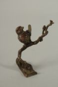 A JAPANESE BRONZE BIRD IN A TREE. 9cms high.