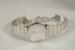 A CALVIN KLEIN STAINLESS STEEL WRISTWATCH. K6C.2XI in box.